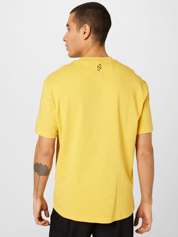 PUMA T-Shirt 'PUMA x NJR' in Gelb