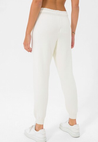 Effilé Pantalon de sport Jimmy Sanders en blanc