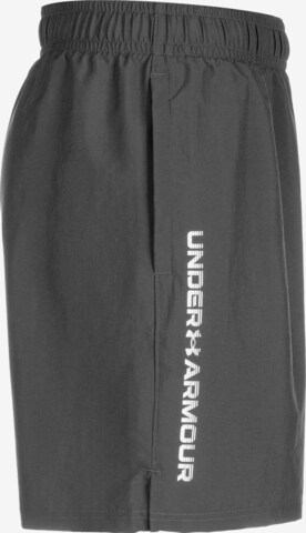 Regular Pantalon de sport UNDER ARMOUR en gris