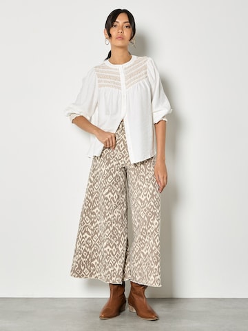 Chemisier ' ' Apricot en blanc