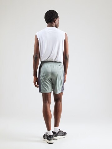 regular Pantaloni sportivi 'Challenger' di UNDER ARMOUR in verde