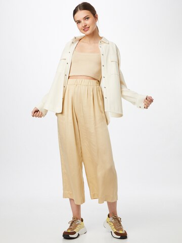 Wide leg Pantaloni con pieghe 'EUNICE' di Bizance Paris in beige