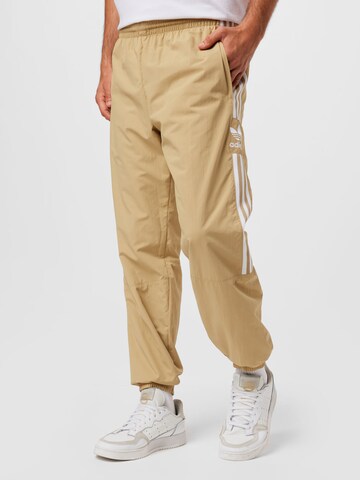 Tapered Pantaloni di ADIDAS ORIGINALS in beige: frontale