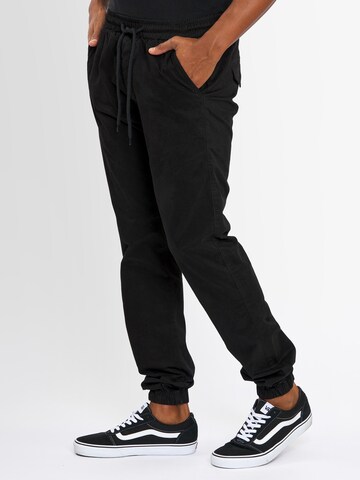 Alessandro Salvarini Tapered Pants in Black: front