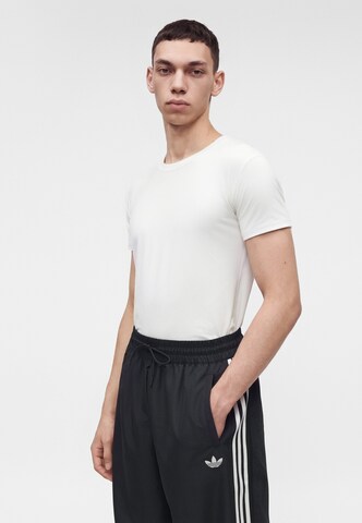 juoda ADIDAS ORIGINALS Laisvas Kelnės 'Basketball Windbreaker'