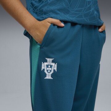 PUMA Regular Sports trousers in Blue