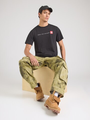 T-Shirt 'NEVER STOP EXPLORING' THE NORTH FACE en noir