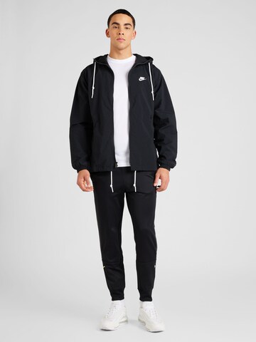 Effilé Pantalon 'AIR' Nike Sportswear en noir