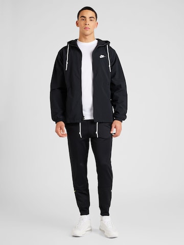 Nike Sportswear Tapered Byxa 'AIR' i svart
