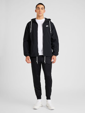 Nike Sportswear Tapered Παντελόνι 'AIR' σε μαύρο