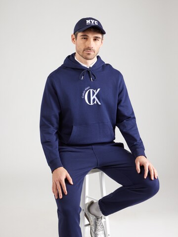 Sweat-shirt Calvin Klein Jeans en bleu : devant