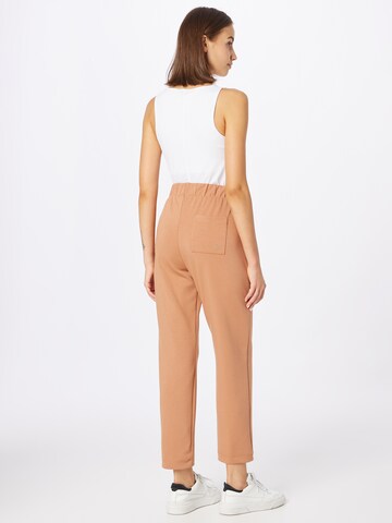 TOMMY HILFIGER Tapered Broek in Oranje