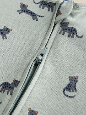 Pijamale de la Next pe bej