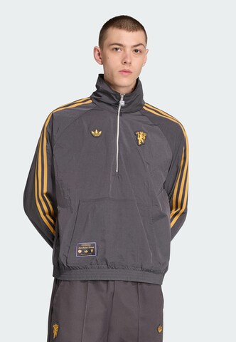 Veste mi-saison 'Manchester United Terrace Icons' ADIDAS ORIGINALS en noir : devant