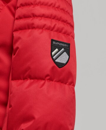 Veste outdoor 'Snow Luxe' Superdry en rouge