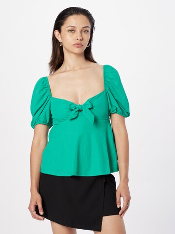 Springfield - Blusa en verde: frente