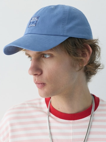 Pull&Bear Čiapka 'REAL LOCAL' - Modrá