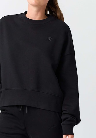 OCEANSAPART - Sudadera 'Jenny' en negro