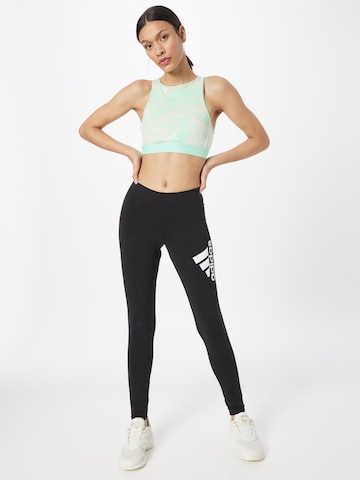 ADIDAS SPORTSWEAR Skinny Workout Pants 'Future Icons Badge Of Sport' in Black