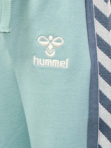 Effilé Pantalon de sport Hummel en bleu