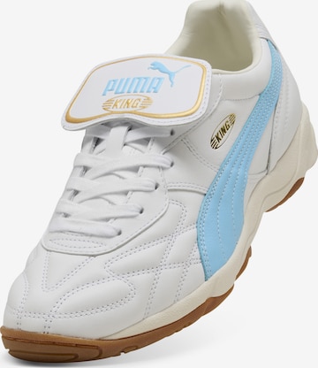 Baskets basses PUMA en blanc : devant