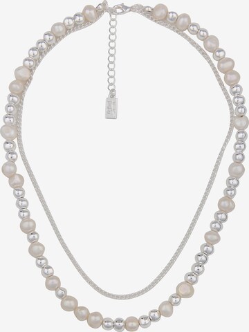 Leslii Necklace in White: front