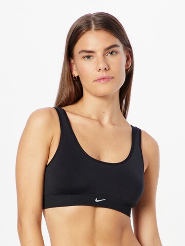 NIKE - Soutien Bustier Soutien de desporto em preto: frente