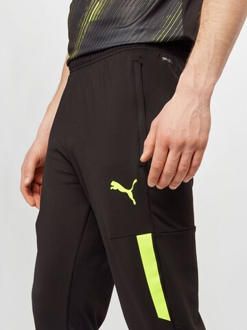 PUMA Slimfit Sportbroek in Zwart