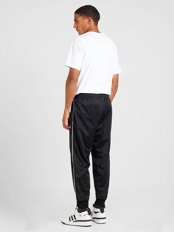 Completo per l'allenamento 'Icons' di Champion Authentic Athletic Apparel in nero