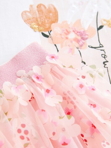 Set Next en rose