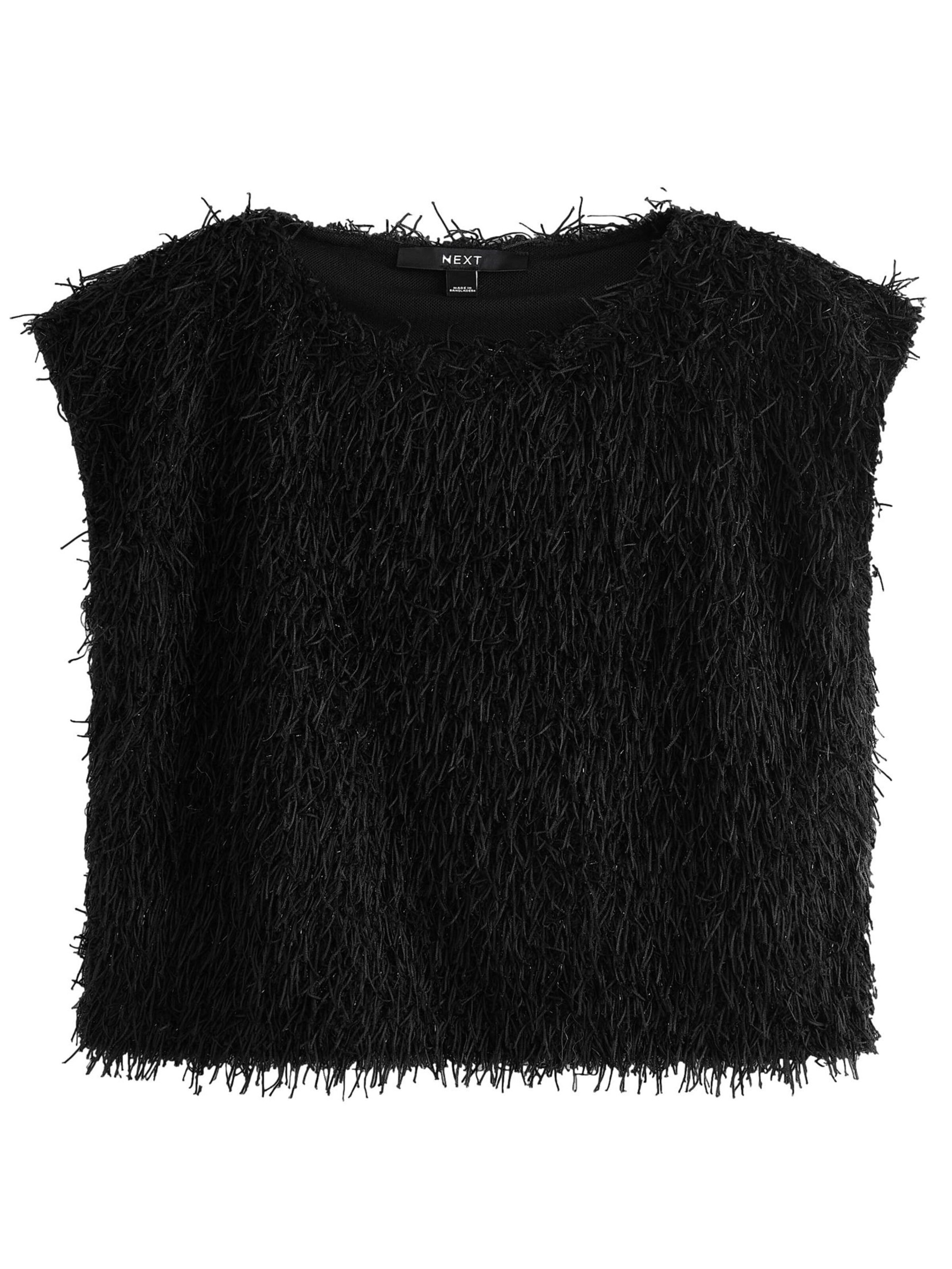 Next T-shirt i svart: framsida