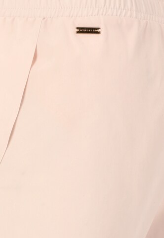 Athlecia Regular Workout Pants 'Alain' in Beige