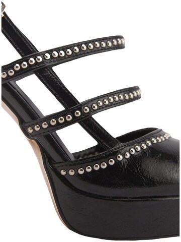 Limoya - Zapatos destalonado 'Milea' en negro