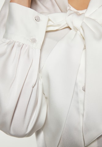 Camicia da donna di faina in bianco