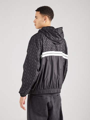 ELLESSE Between-Season Jacket 'Trezi' in Black