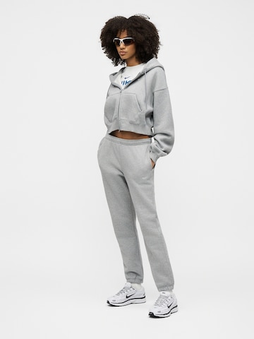 Nike Sportswear Zwężany krój Spodnie w kolorze szary