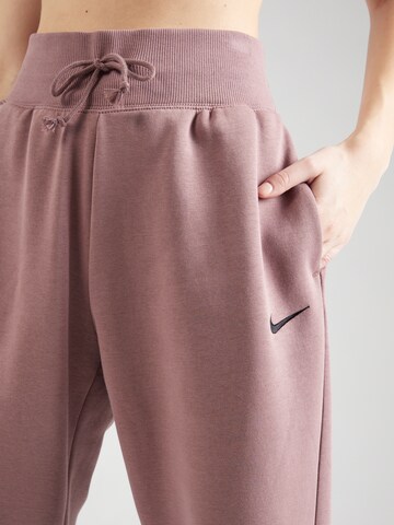 Nike Sportswear - Tapered Pantalón 'Phoenix Fleece' en lila