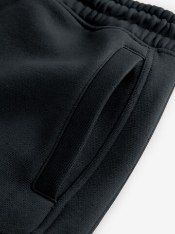 Next Конический (Tapered) Брюки-карго в Черный