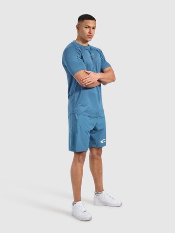 Regular Pantalon de sport ' Powerfit Triple ' Smilodox en bleu