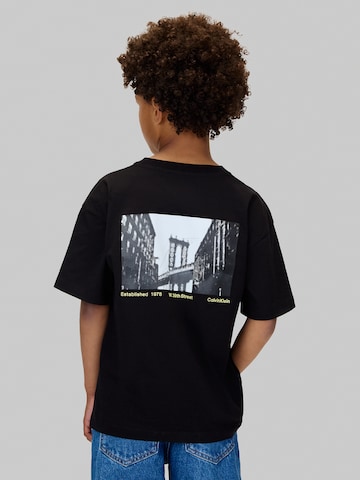 Calvin Klein Jeans Póló 'CITY SCENE' - fekete