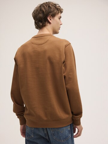 FILA Sweatshirt 'BIELLA regular crewneck sweatshirt' in Bruin
