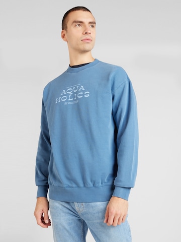 Revolution Sweatshirt i blå: framsida