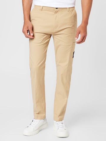 Calvin Klein Jeans - regular Pantalón chino en beige: frente