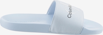 Calvin Klein Jeans Pantoletter i blå