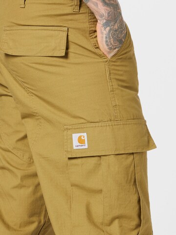 Carhartt WIP Regularen Kargo hlače | zelena barva