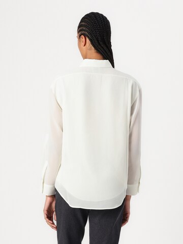 Calvin Klein Μπλούζα σε πράσινο: πίσω