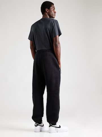Nike Sportswear Tapered Broek 'TECH FLEECE' in Zwart