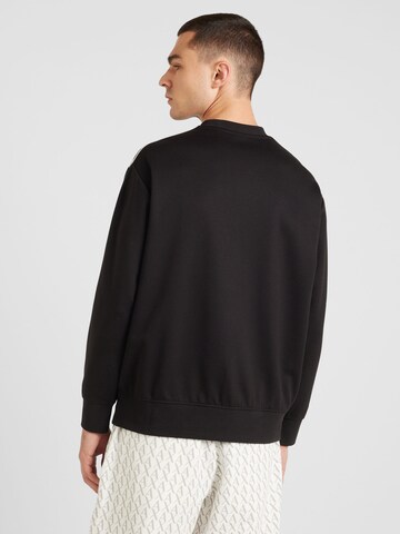 ARMANI EXCHANGE - Sudadera en negro