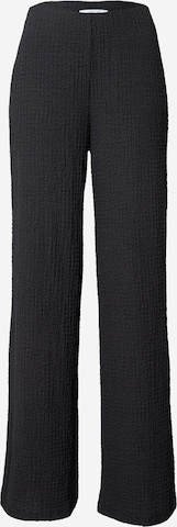 ABOUT YOU Bő szár Nadrág 'Nalani' - fekete: elől