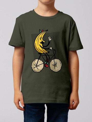 Maglietta 'Banana Rider' di watabout.kids in verde: frontale